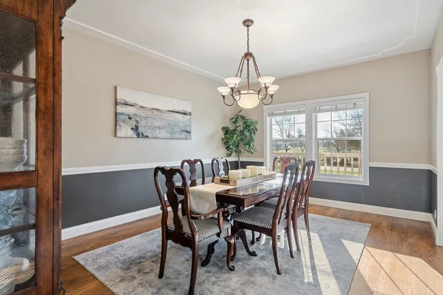 a view of a city with swimming pool and mountains in the background