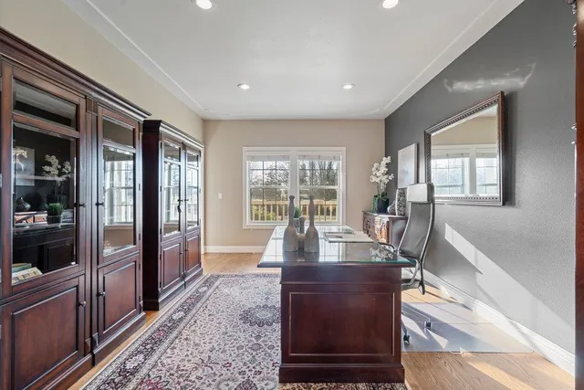 a view of a swimming pool with an outdoor seating