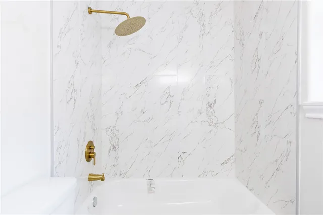 a bathroom with a bathtub