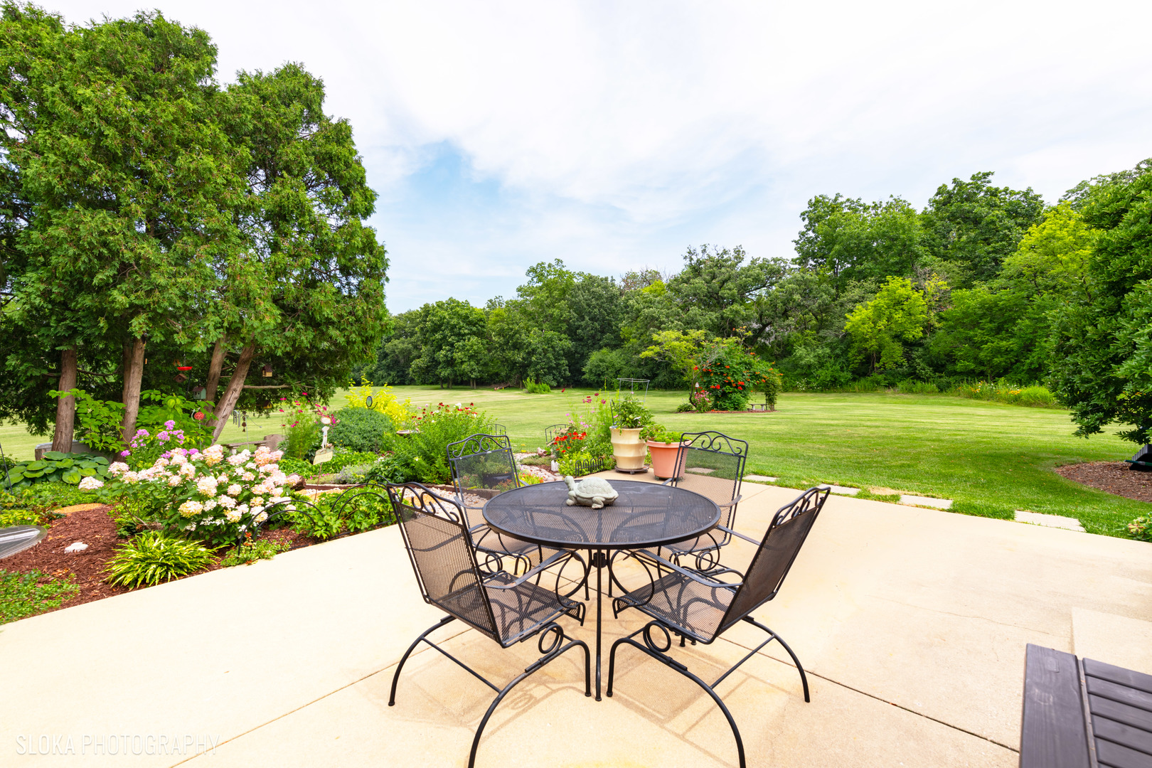 2920 Springbrook Road Crystal Lake, IL 60012 - Photo 29 of 39 a view of a chairs and table in the garden