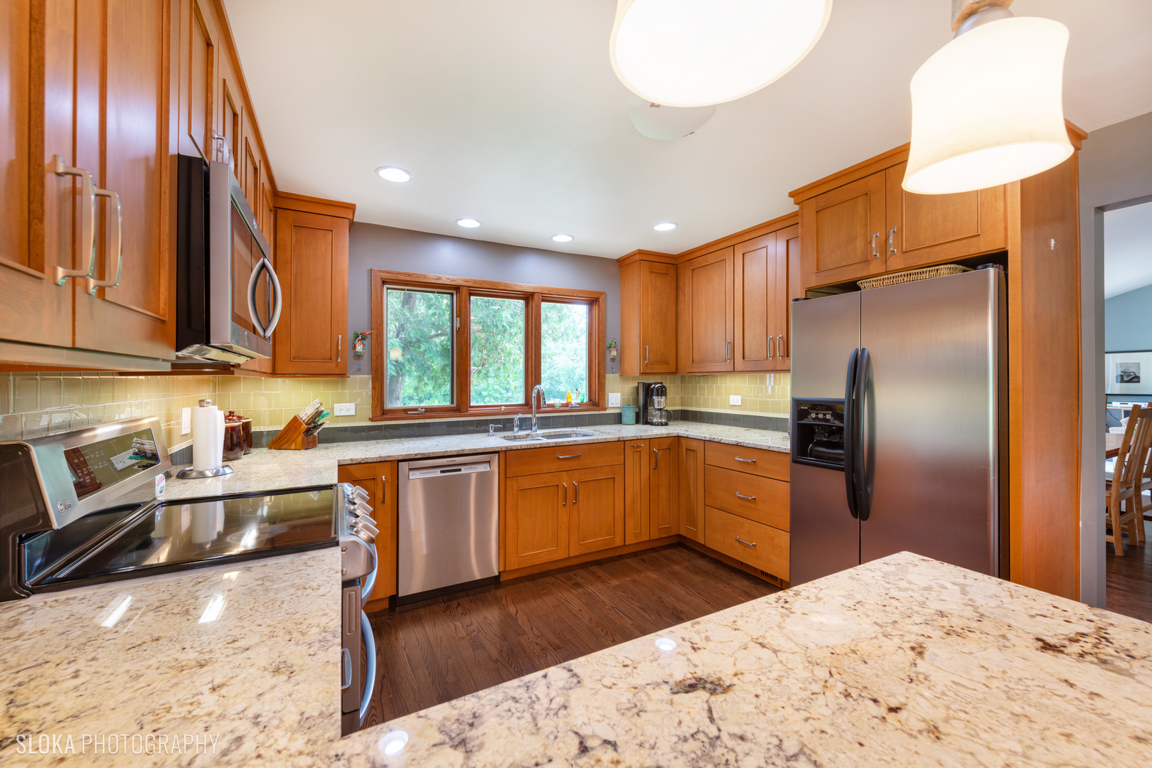 2920 Springbrook Road Crystal Lake, IL 60012 - Photo 8 of 39 a kitchen with stainless steel appliances granite countertop a refrigerator sink and cabinets