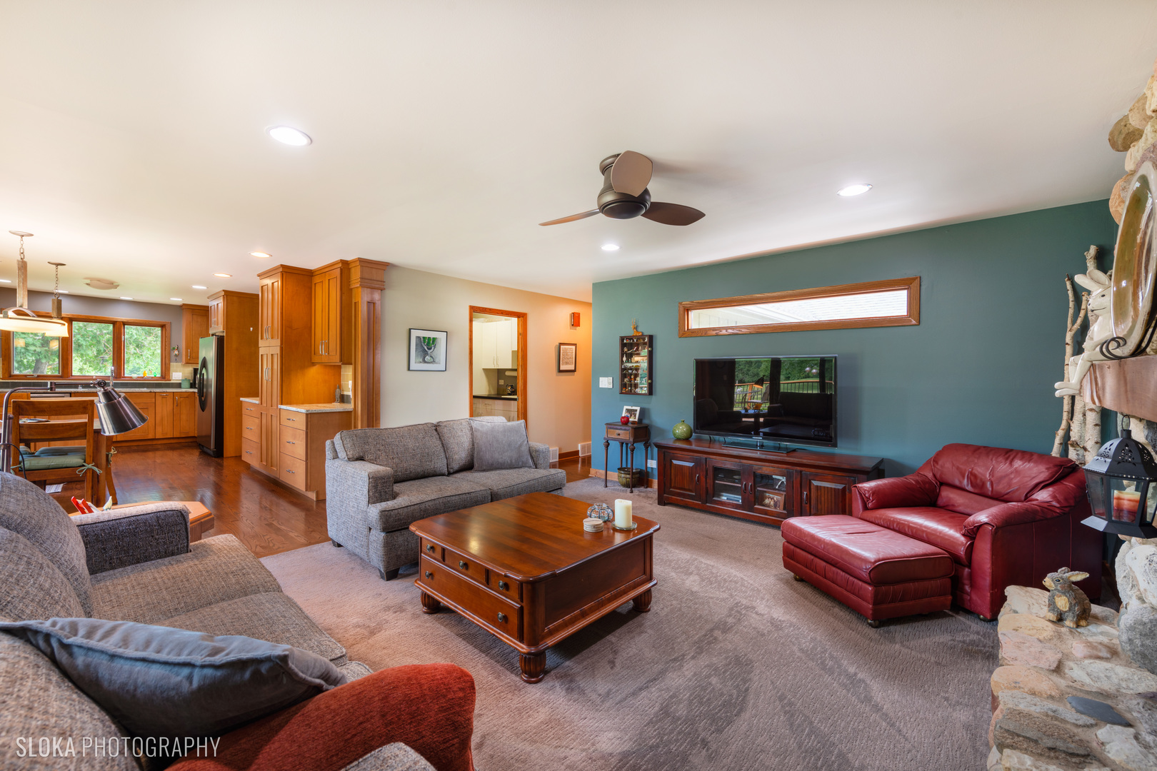 2920 Springbrook Road Crystal Lake, IL 60012 - Photo 10 of 39 a living room with furniture and a flat screen tv