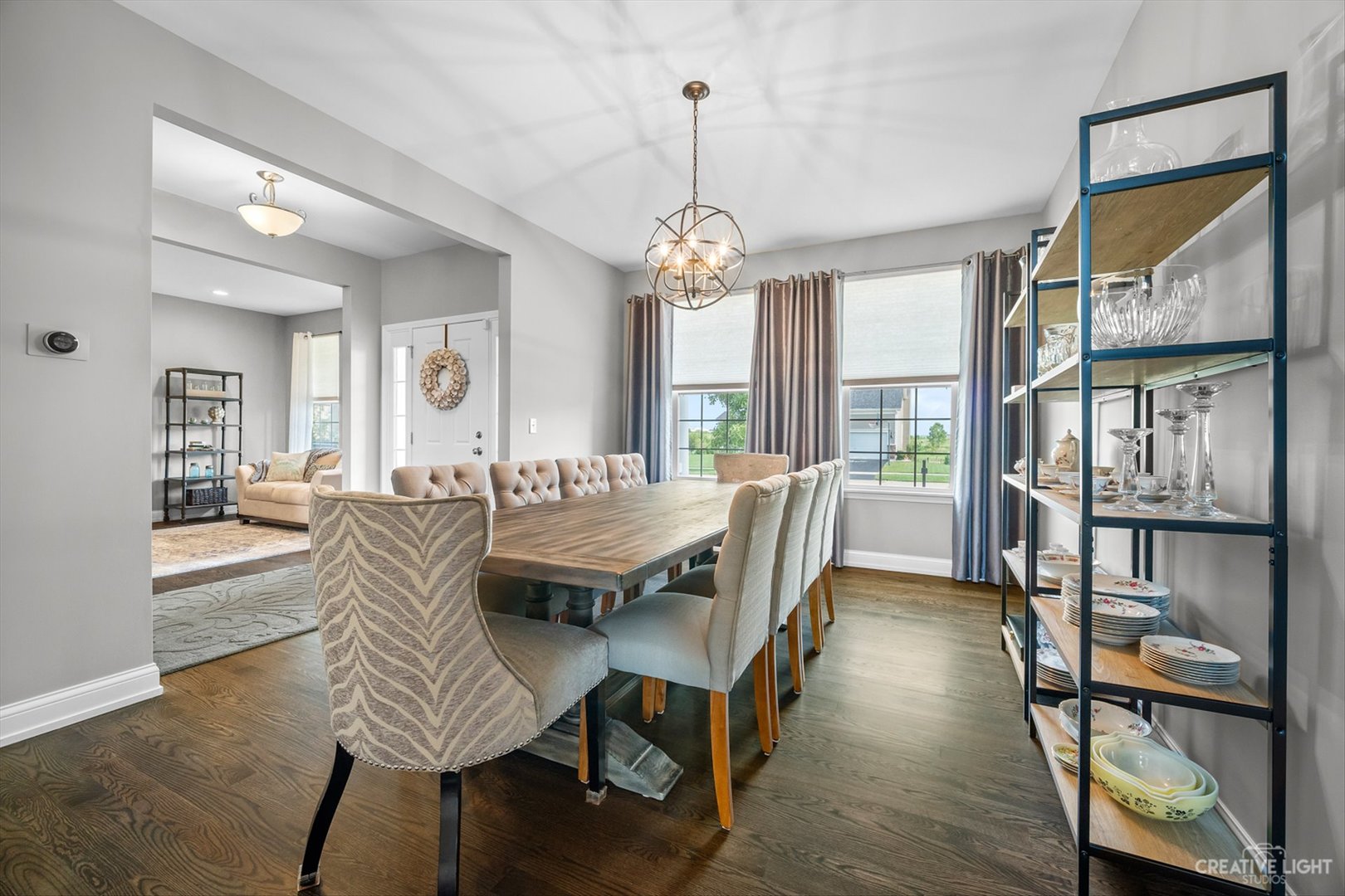 672 Ridgeview Lane Sugar Grove, IL 60554 - Photo 11 of 35 a view of a a dining room with furniture window and wooden floor