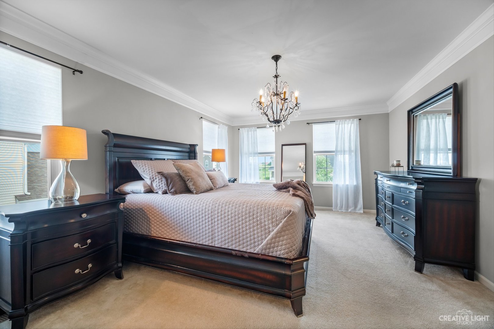 672 Ridgeview Lane Sugar Grove, IL 60554 - Photo 19 of 35 a spacious bedroom with a bed and window
