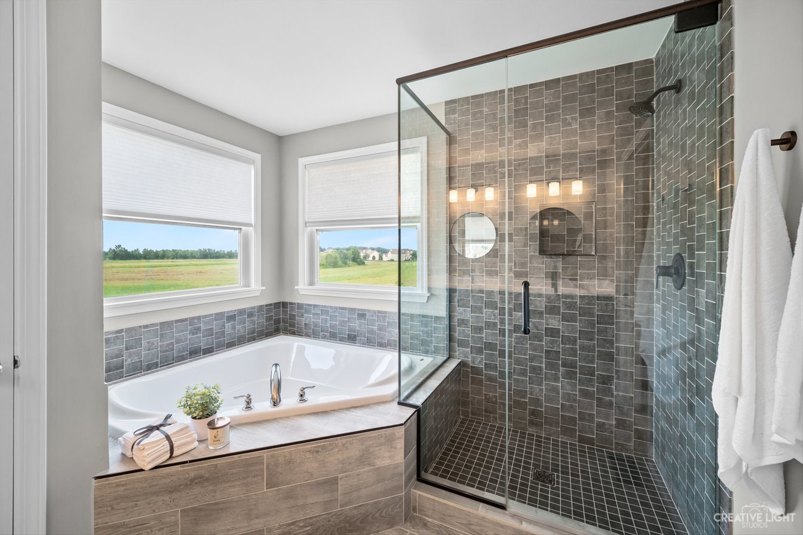 672 Ridgeview Lane Sugar Grove, IL 60554 - Photo 22 of 35 a bathroom with a bathtub and a shower