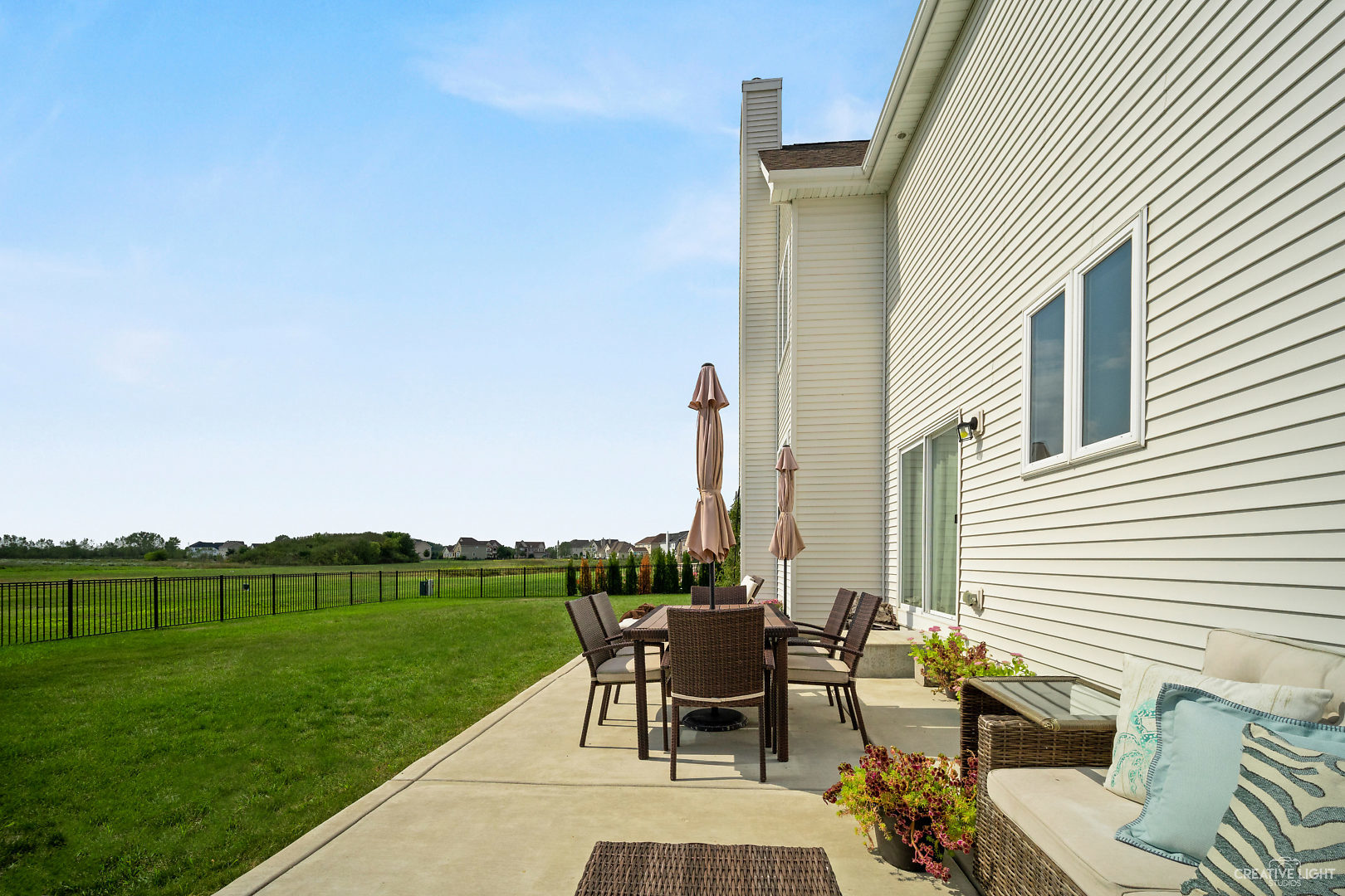 672 Ridgeview Lane Sugar Grove, IL 60554 - Photo 31 of 35 a view of a patio with a table chairs and backyard