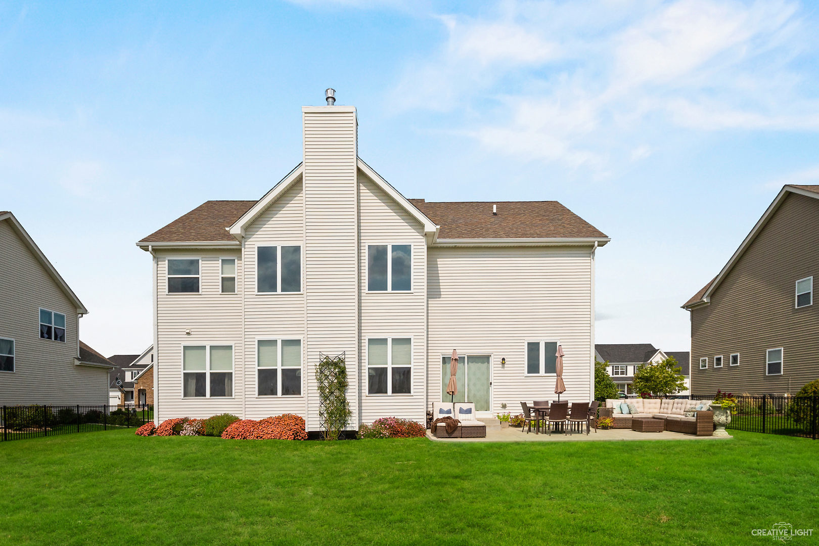 672 Ridgeview Lane Sugar Grove, IL 60554 - Photo 32 of 35 a front view of a house with a large garden and plants