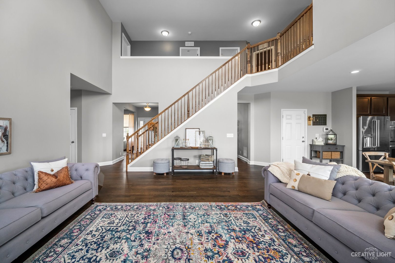 672 Ridgeview Lane Sugar Grove, IL 60554 - Photo 10 of 35 a living room with furniture and a rug