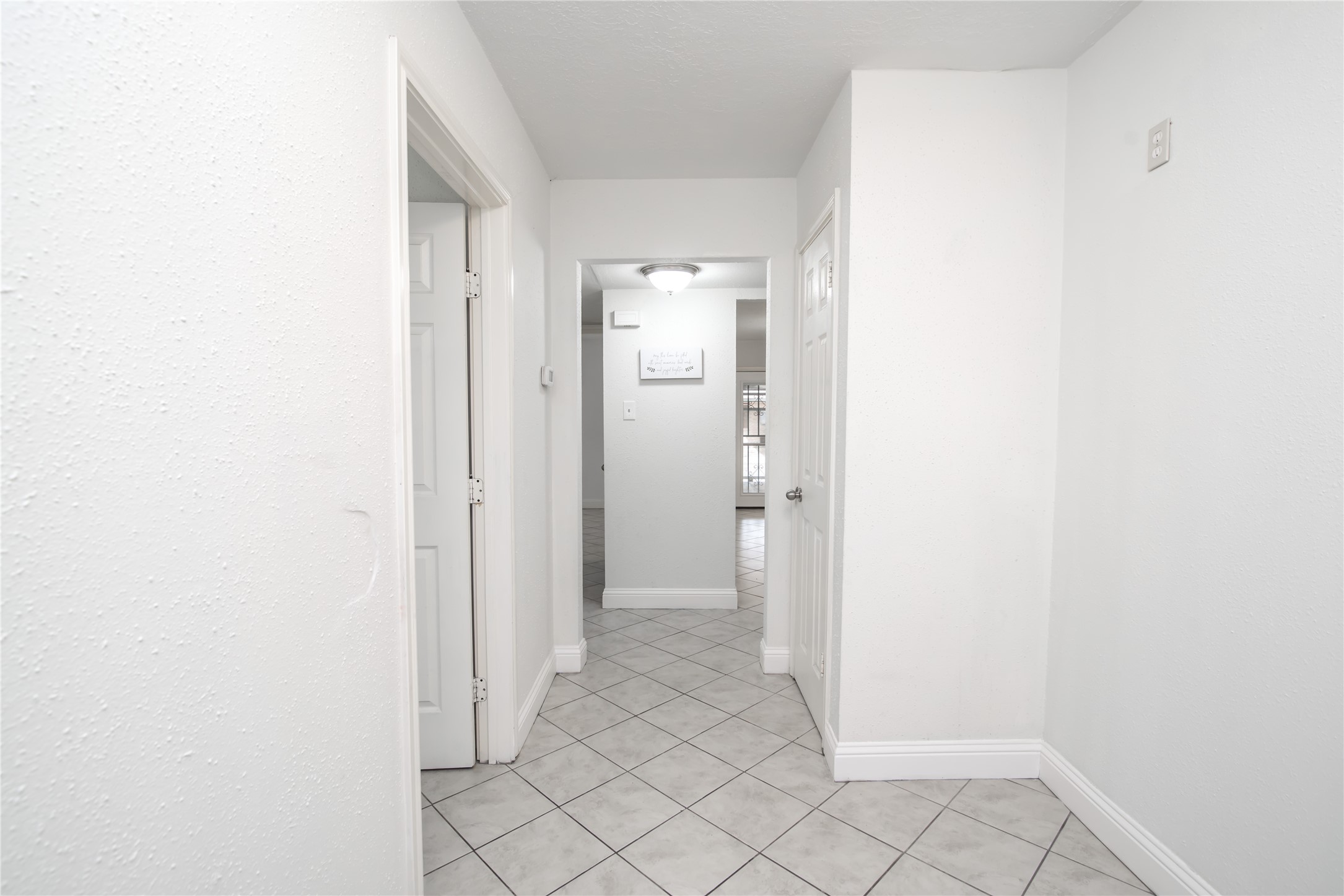 7237 Cook Road Houston, TX 77072 - Photo 13 of 21 a view of a room with white doors