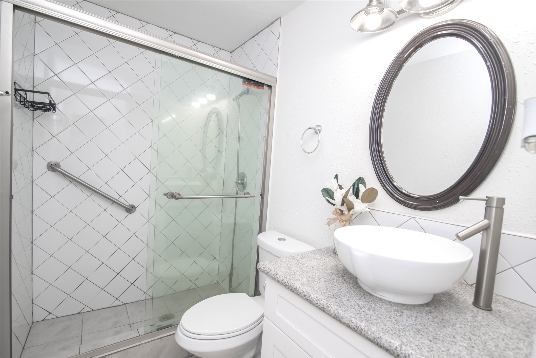7237 Cook Road Houston, TX 77072 - Photo 19 of 21 a bathroom with a toilet a sink and a mirror