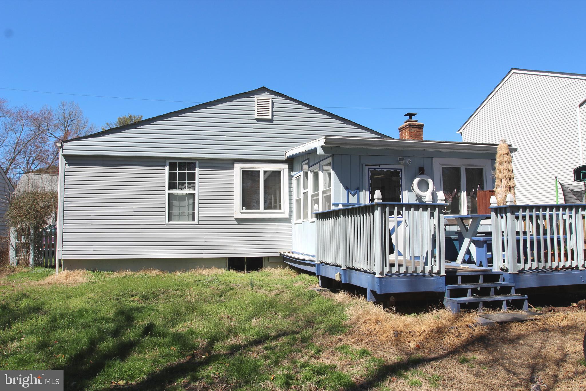 7713 Leigh Road Glen Burnie, MD 21060 - Photo 2 of 2 a view of a house with wooden fence