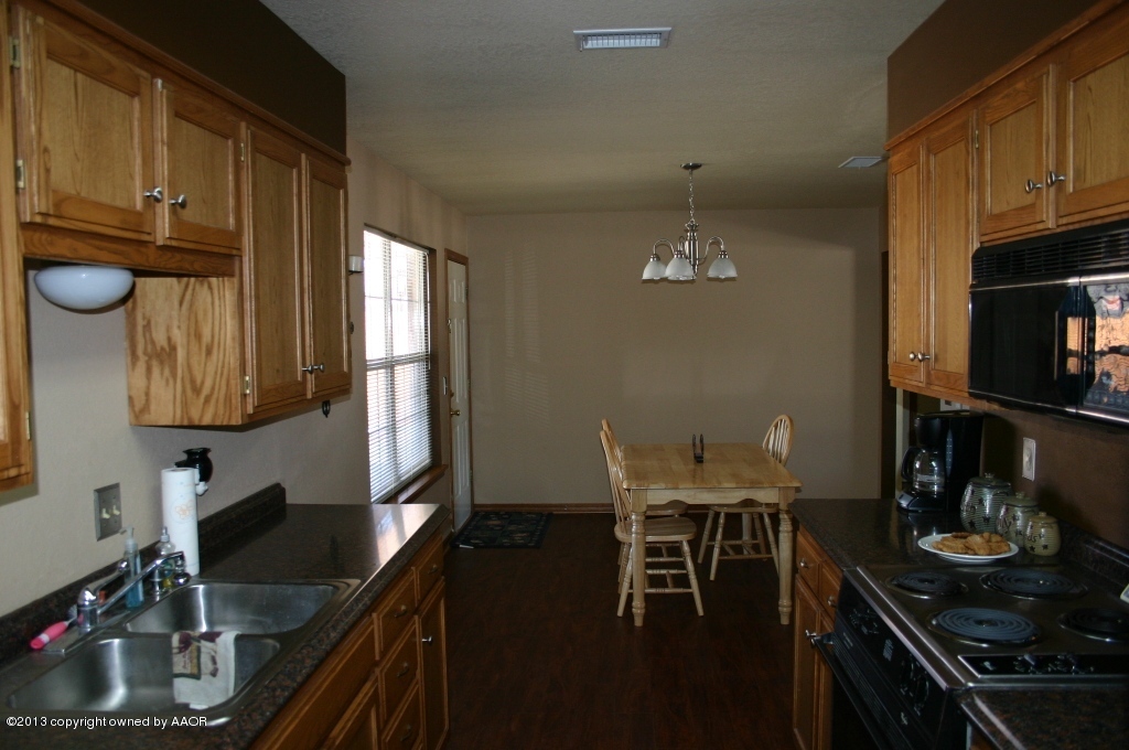 3408 Reeder Drive Amarillo, TX 79119 - Photo 9 of 30 Kitchen into Eating Area