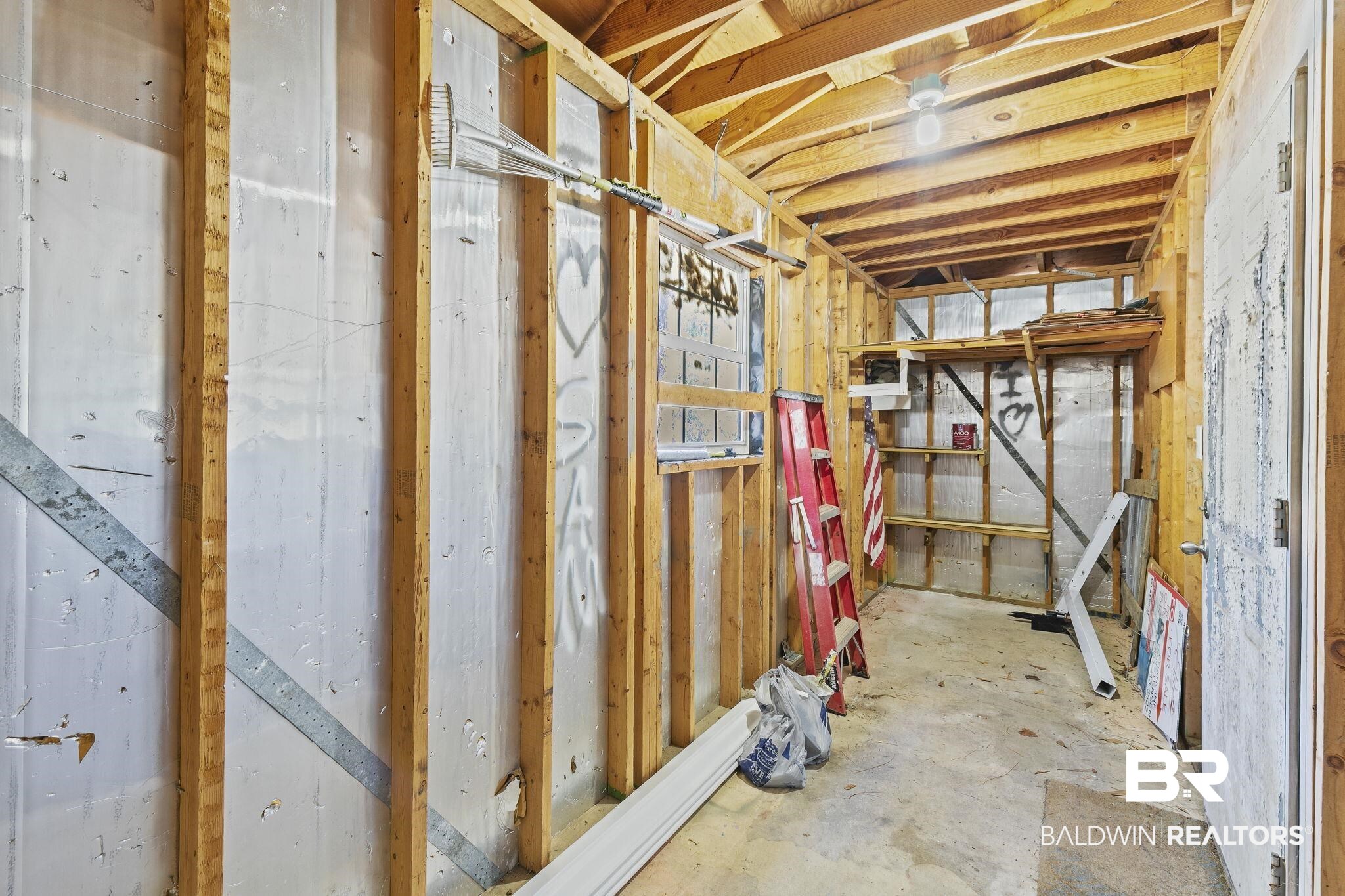 359 Ridgewood Drive Daphne, AL 36526 - Photo 50 of 73 Large storage area attached to carport