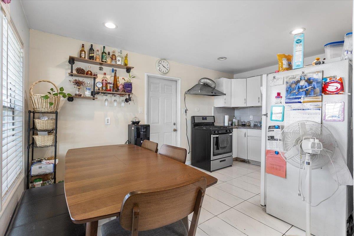 33834 9th Street Union City, CA 94587 - Photo 16 of 25 a kitchen with granite countertop cabinets and refrigerator
