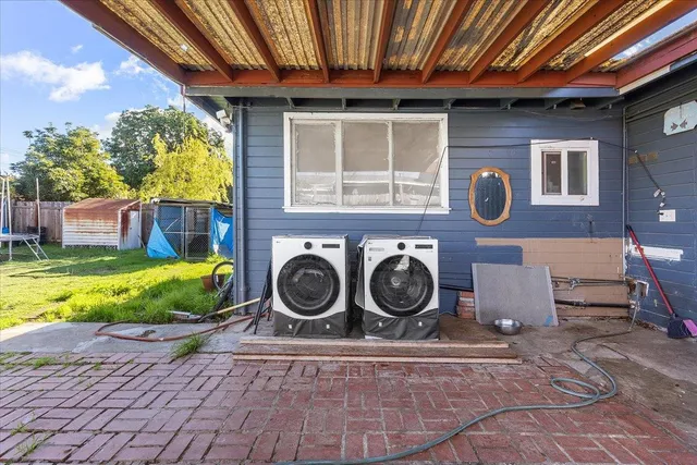 a utility room with dryer and washer