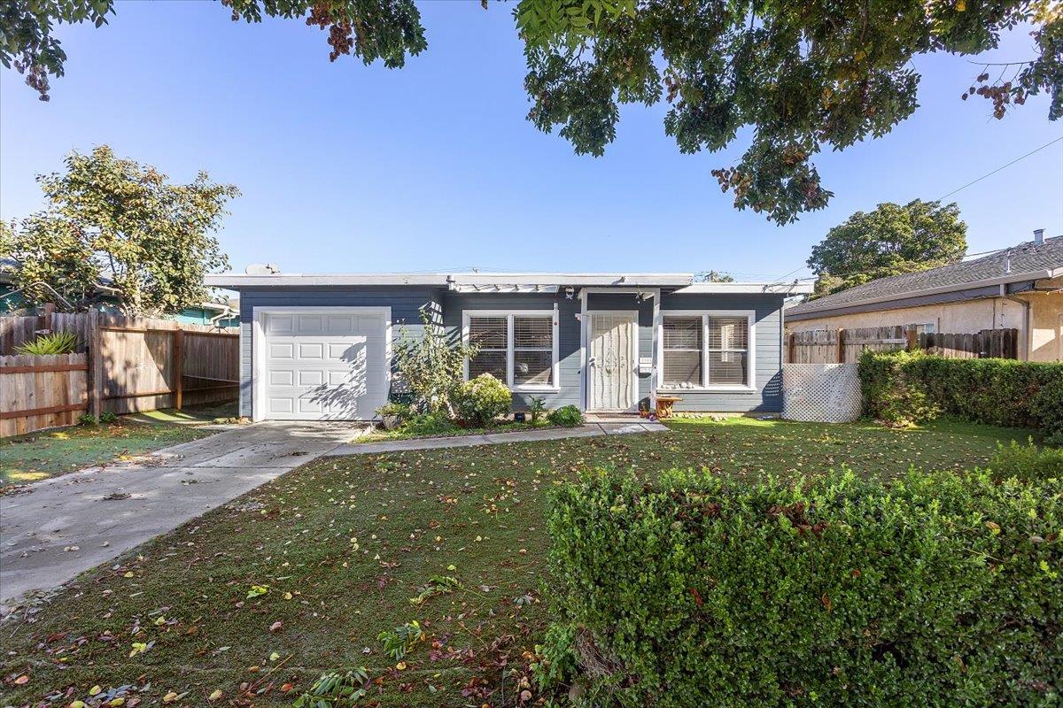 33834 9th Street Union City, CA 94587 - Photo 4 of 25 front view of a house with a yard