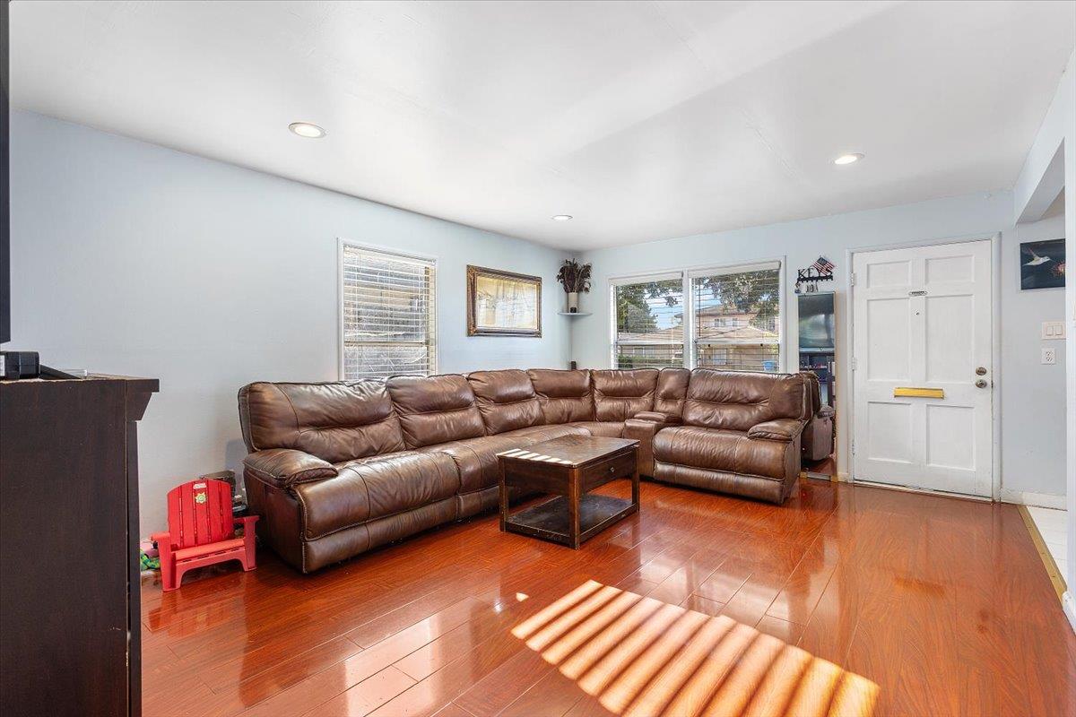 33834 9th Street Union City, CA 94587 - Photo 10 of 25 a living room with furniture a rug and a window
