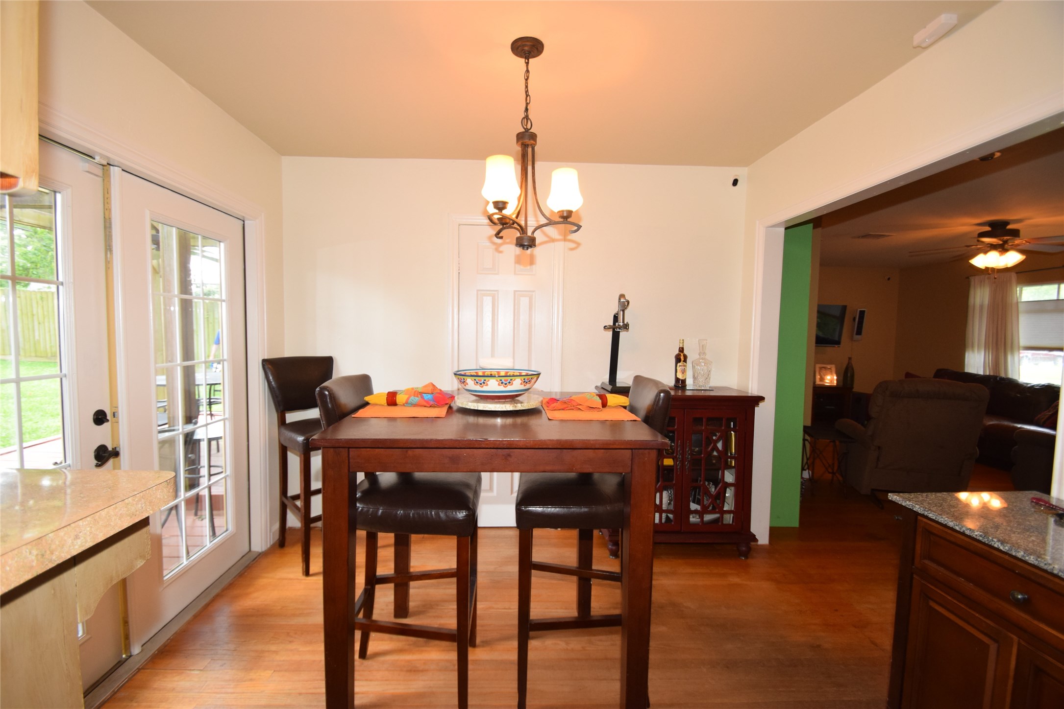 1130 Stonecrest Drive Houston, TX 77018 - Photo 11 of 28 Breakfast area highlighted by hardwood floors, French doors to patio area, open to the living room and kitchen.