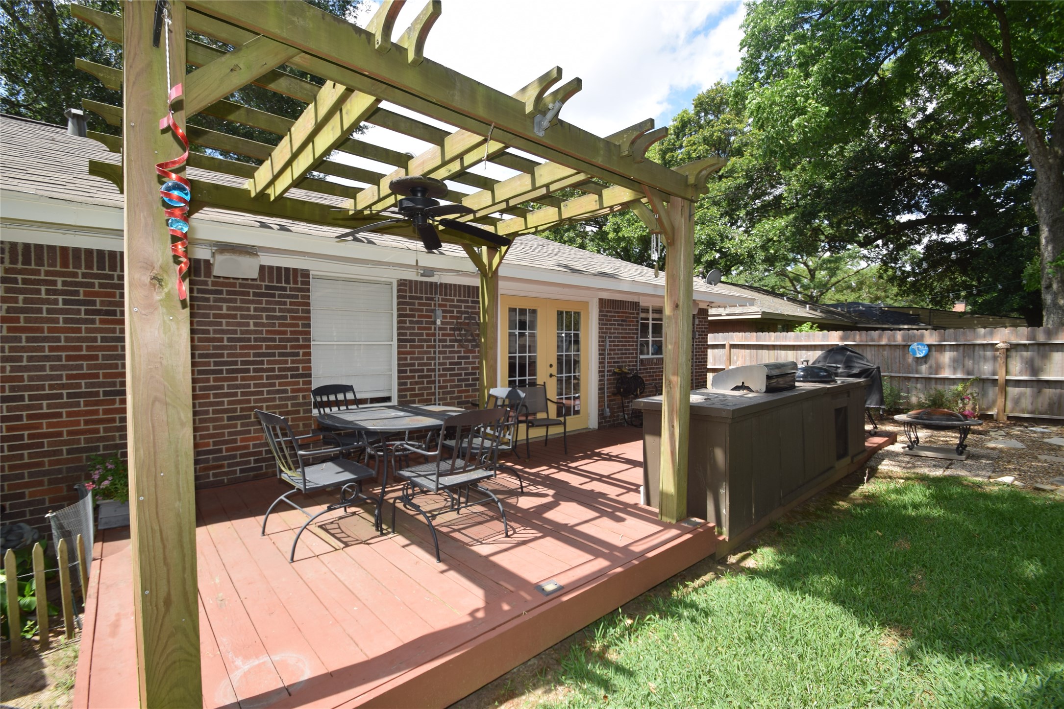 1130 Stonecrest Drive Houston, TX 77018 - Photo 23 of 28 Decked patio area overlooking the fully fenced backyard.