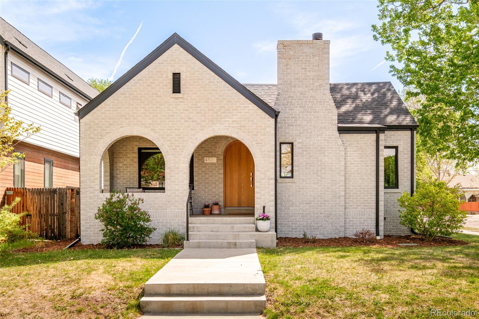 4100 Raleigh Street Denver, CO 80212 - Photo 1 of 48 a front view of a house with garden