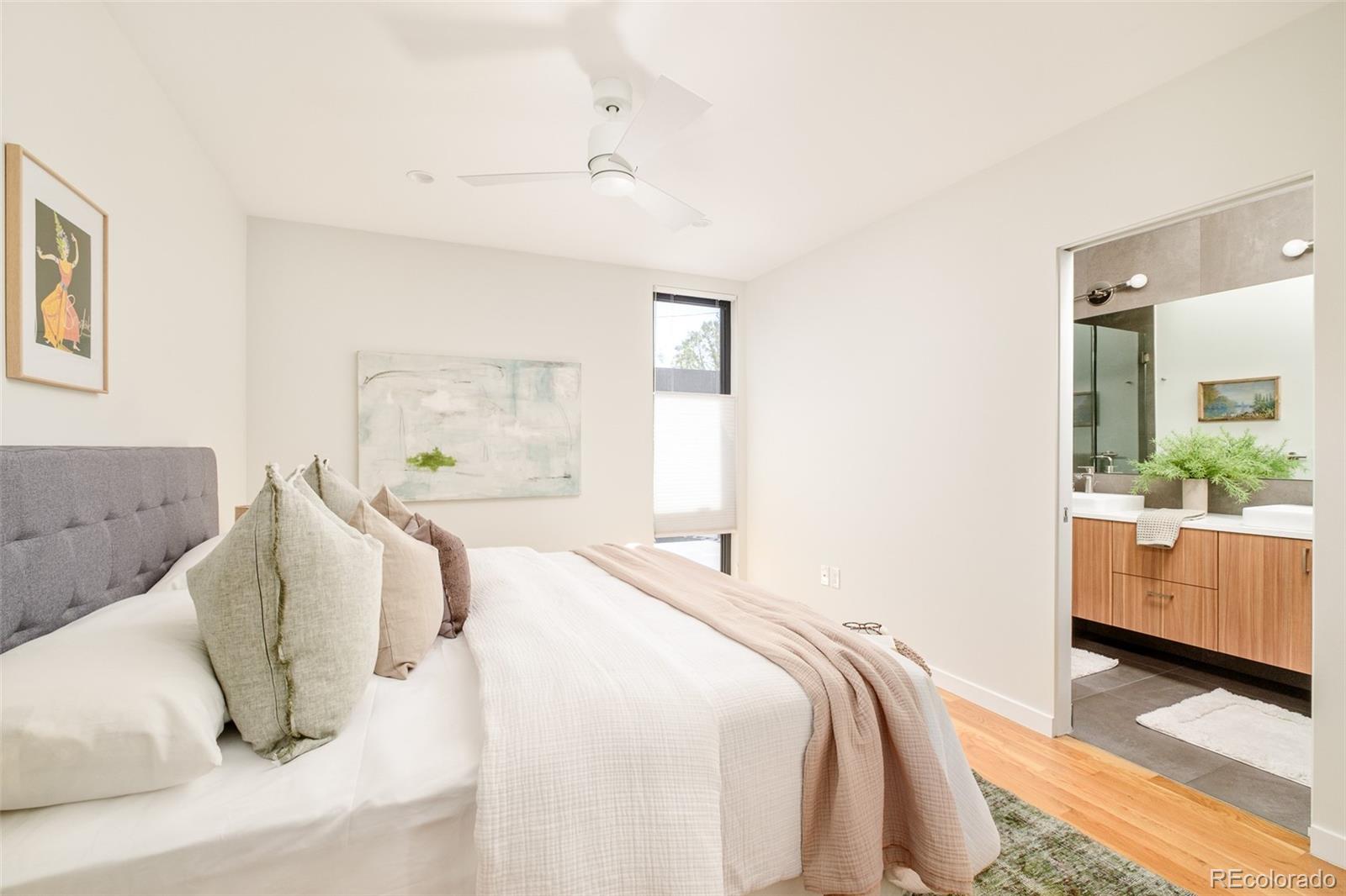 4100 Raleigh Street Denver, CO 80212 - Photo 23 of 48 a bedroom with a bed and a dresser