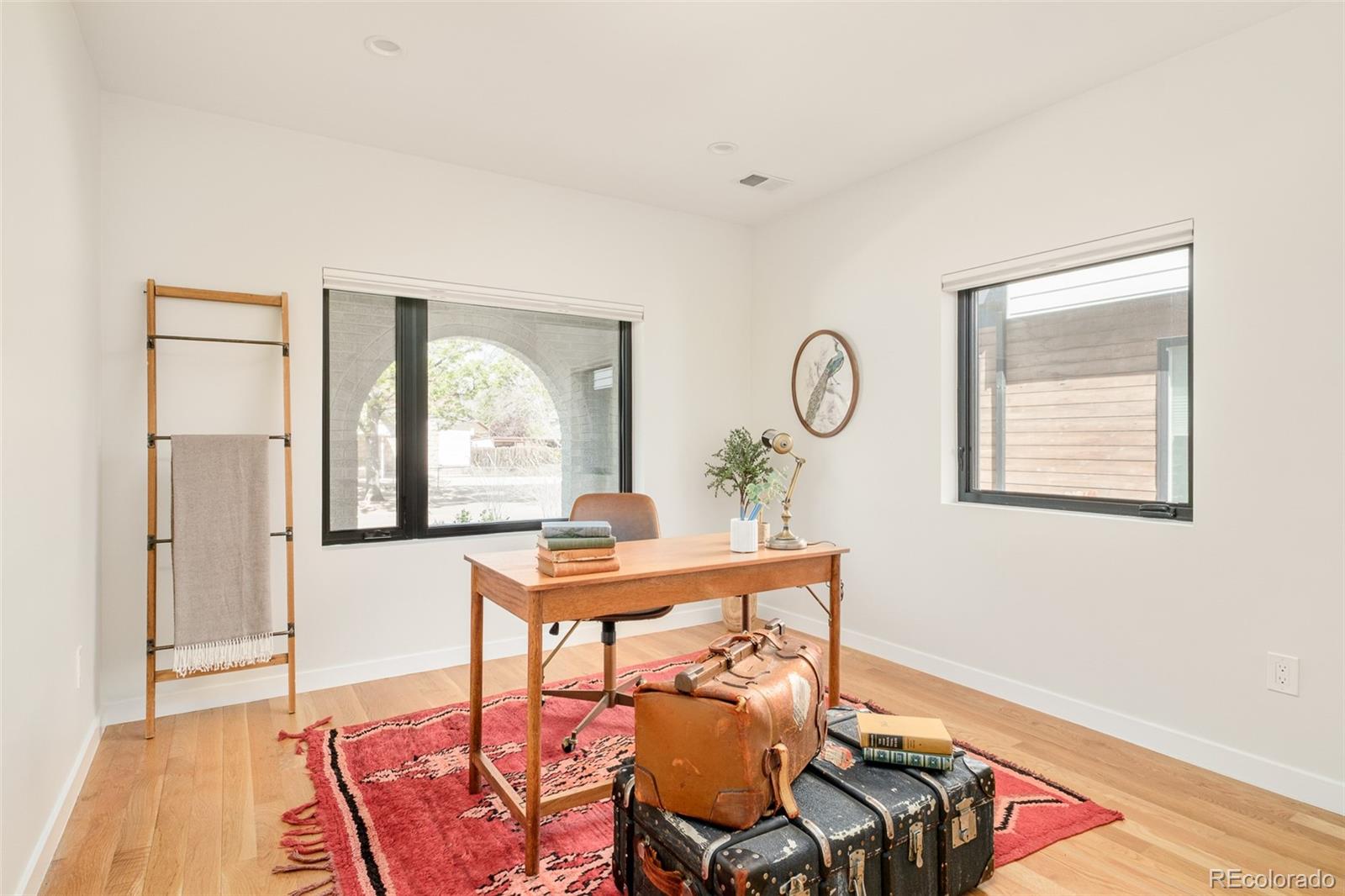4100 Raleigh Street Denver, CO 80212 - Photo 32 of 48 a view of a livingroom with furniture and window