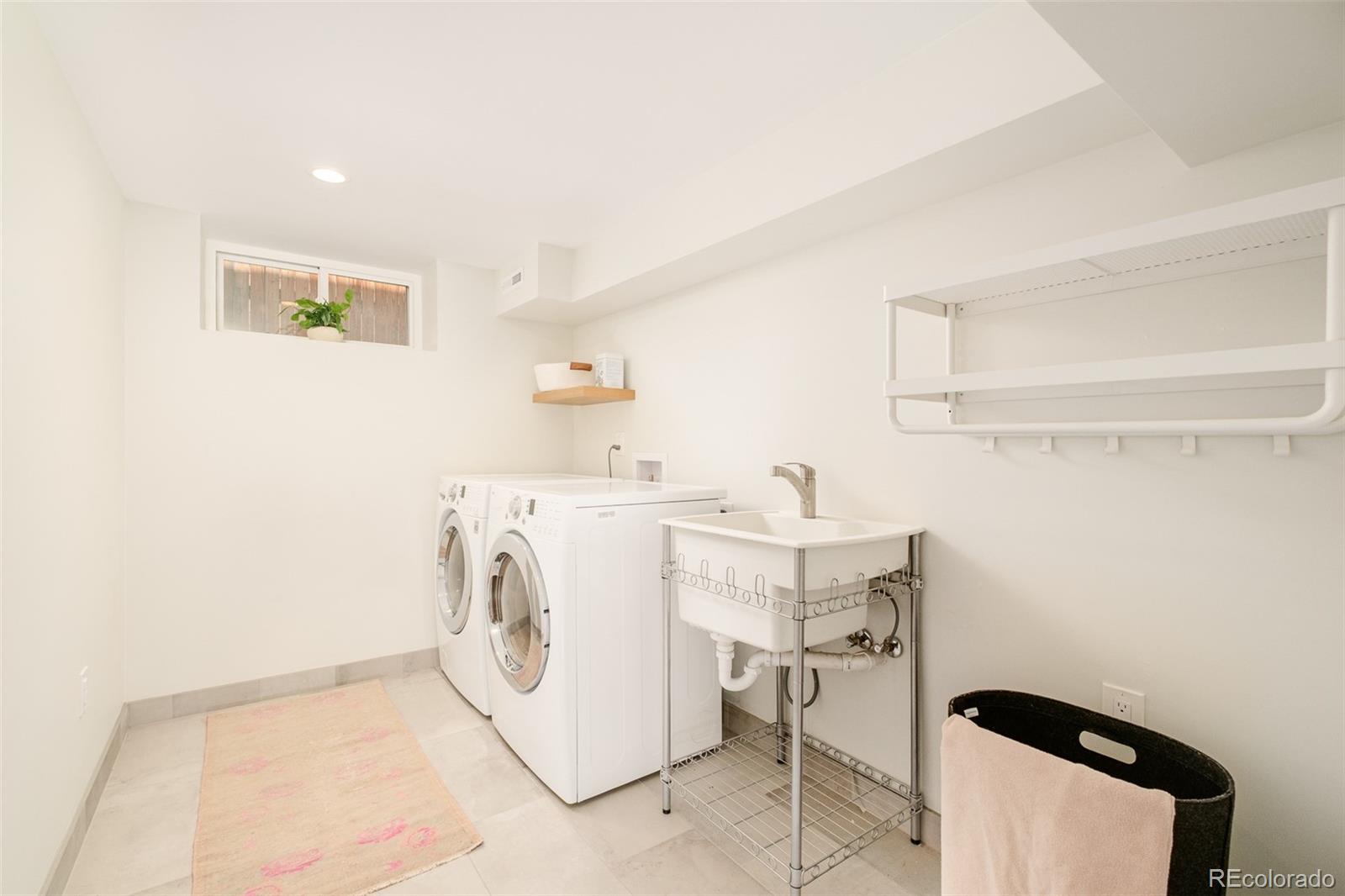 4100 Raleigh Street Denver, CO 80212 - Photo 35 of 48 a utility room with dryer and washer