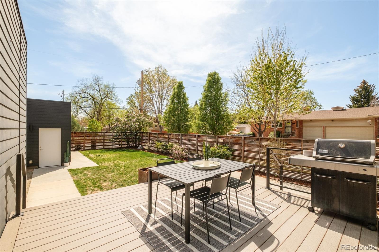 4100 Raleigh Street Denver, CO 80212 - Photo 39 of 48 a view of a backyard with sitting area