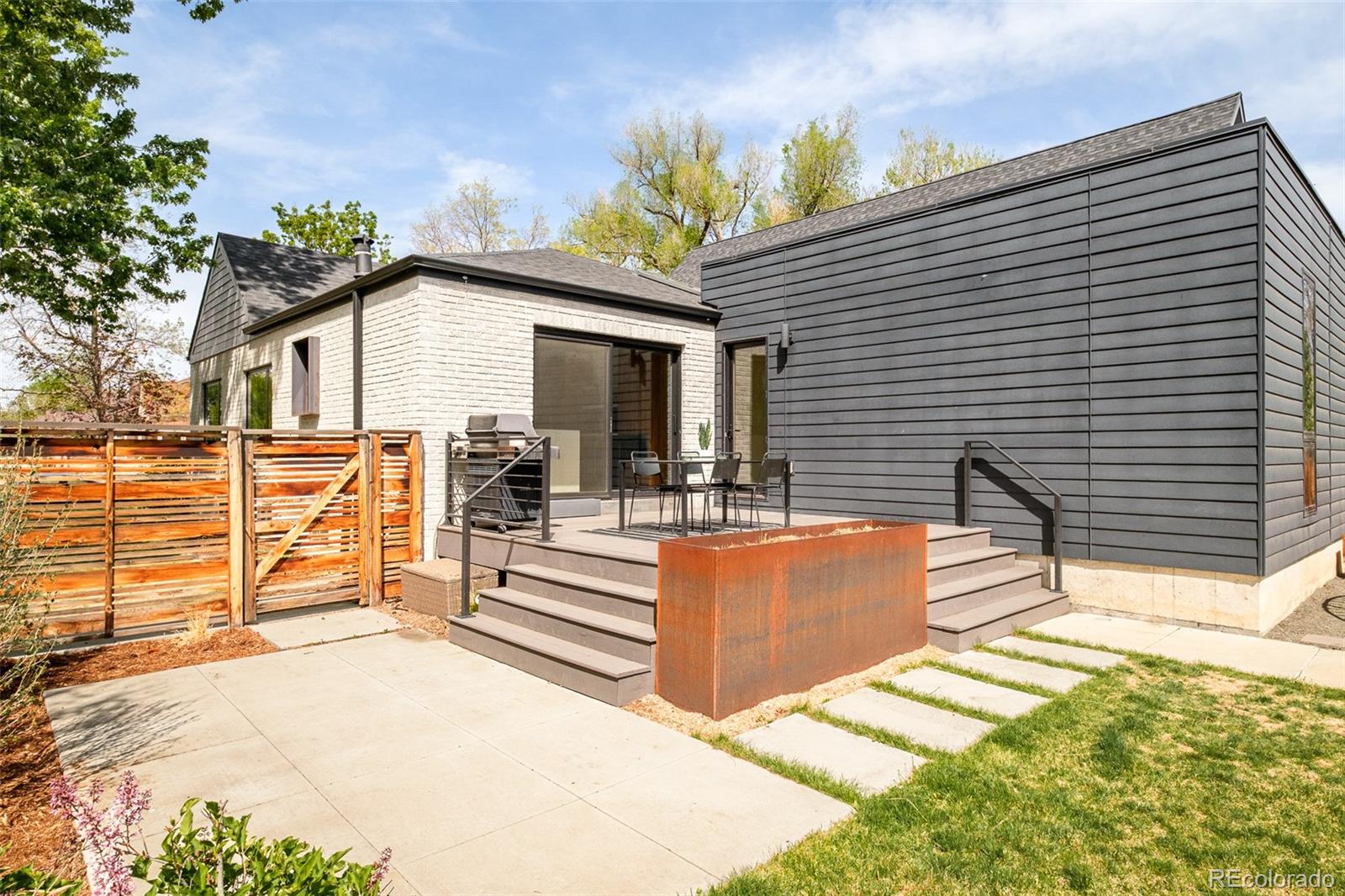 4100 Raleigh Street Denver, CO 80212 - Photo 40 of 48 a view of a house with a patio