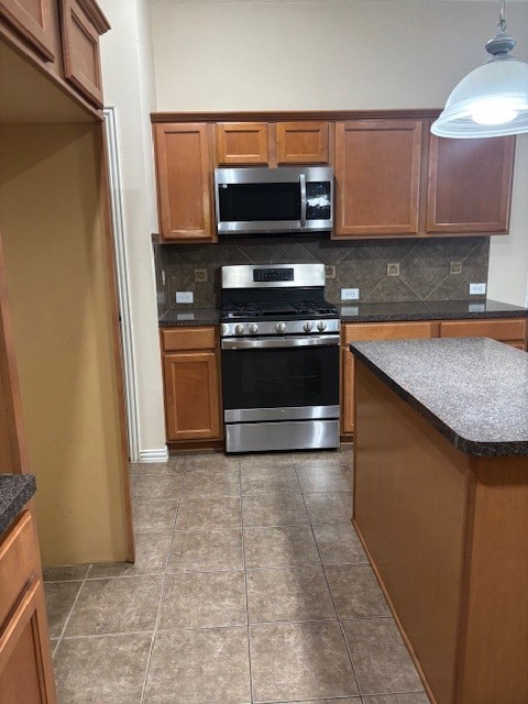 18031 Redbud Terrace Lane Cypress, TX 77433 - Photo 9 of 22 Gas Stove with Microwave.