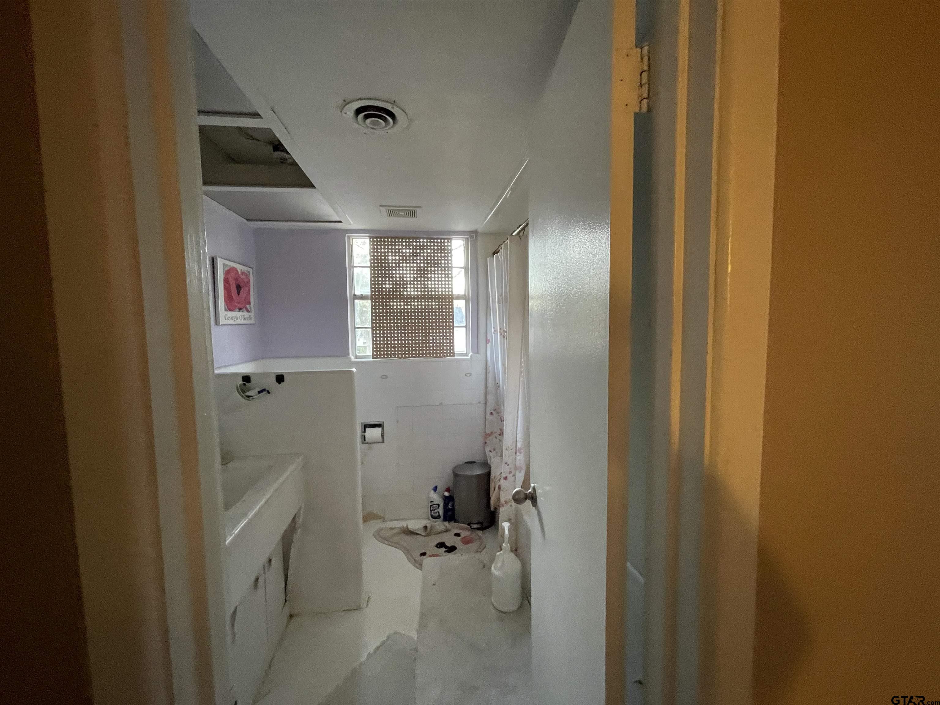 3300 Brookside Drive Tyler, TX 75701 - Photo 15 of 25 a bathroom with a bathtub and shower