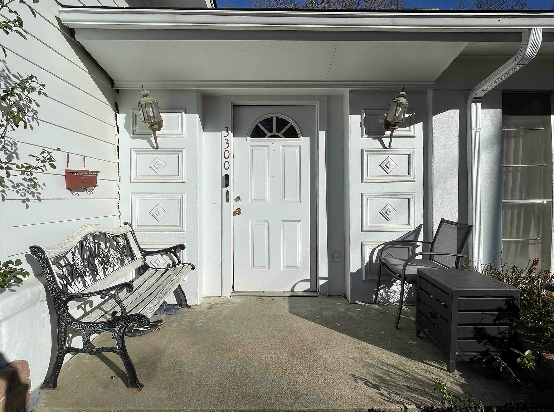 3300 Brookside Drive Tyler, TX 75701 - Photo 2 of 25 a living room with furniture and wooden floor