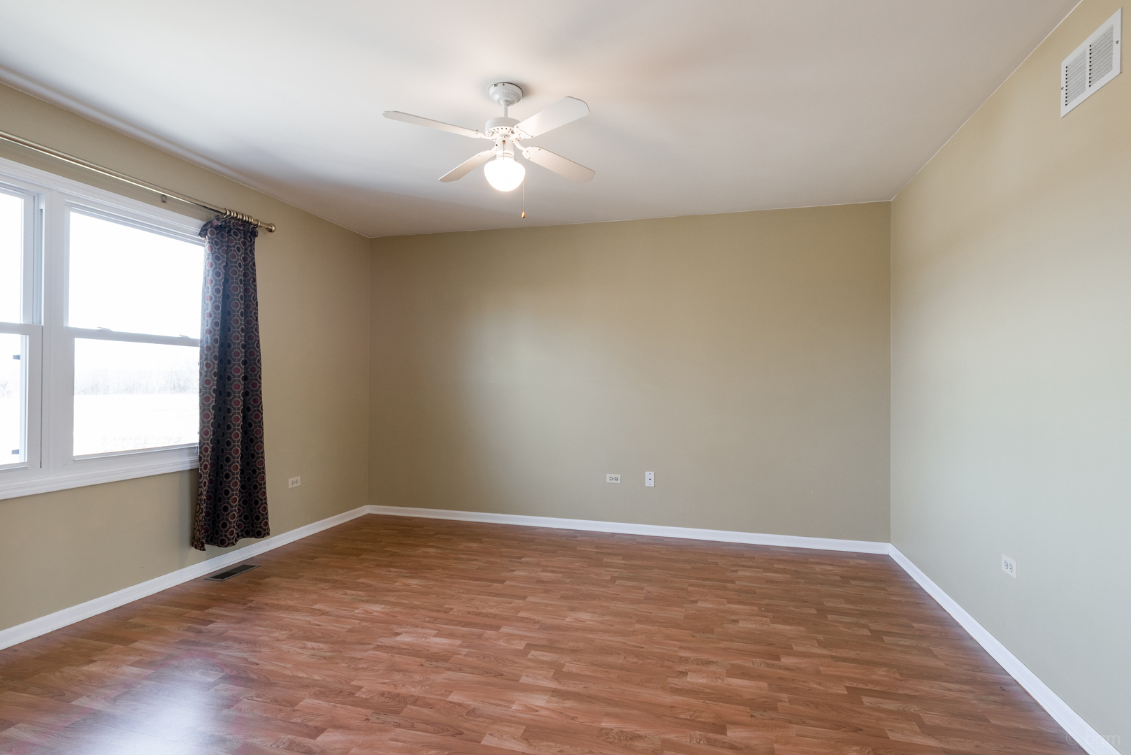 10 Ashcroft Court Bolingbrook, IL 60490 - Photo 15 of 30 wooden floor in an empty room with a window