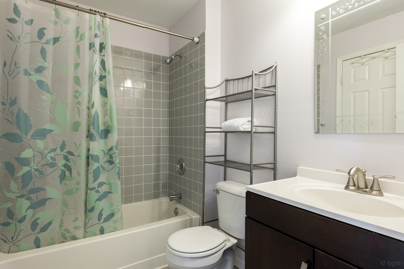 10 Ashcroft Court Bolingbrook, IL 60490 - Photo 16 of 30 a bathroom with a bathtub shower sink vanity and toilet