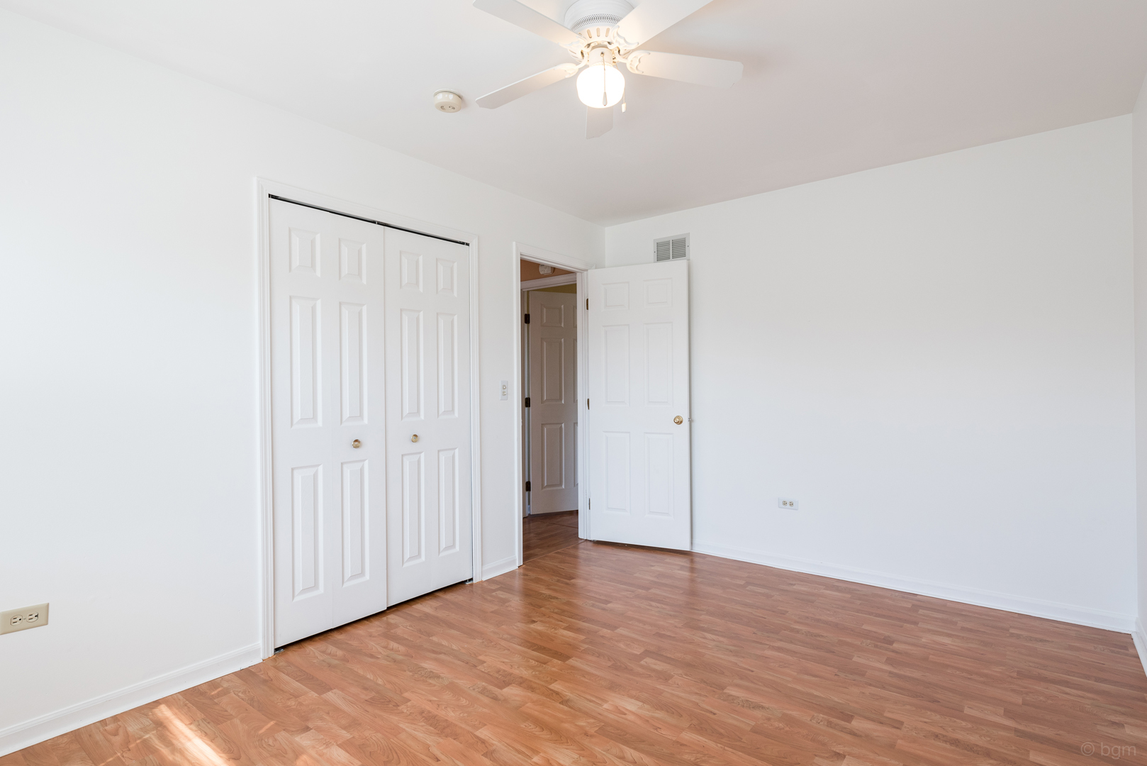 10 Ashcroft Court Bolingbrook, IL 60490 - Photo 17 of 30 a view of an empty room with wooden floor