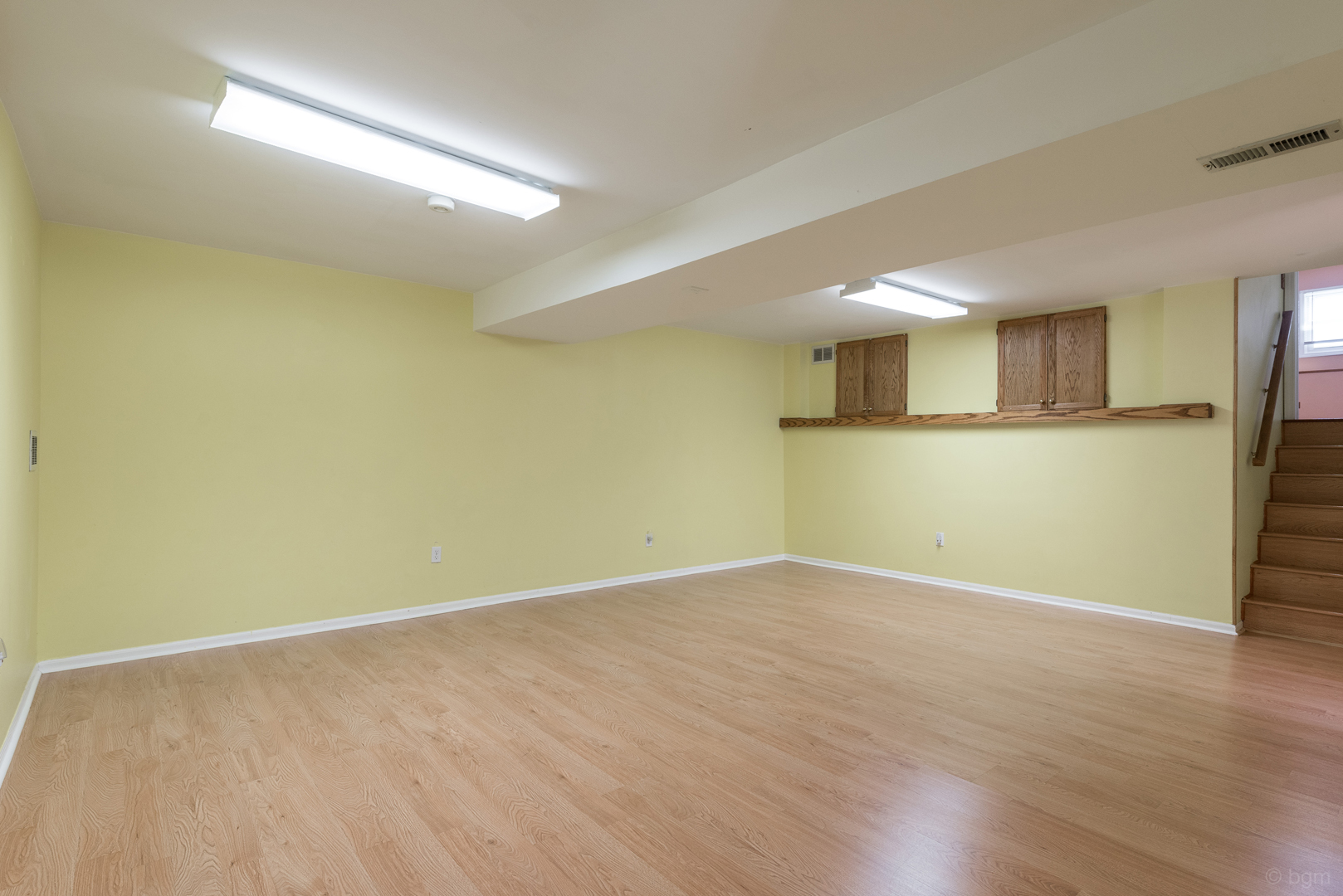 10 Ashcroft Court Bolingbrook, IL 60490 - Photo 25 of 30 a view of a big room with wooden floor and windows