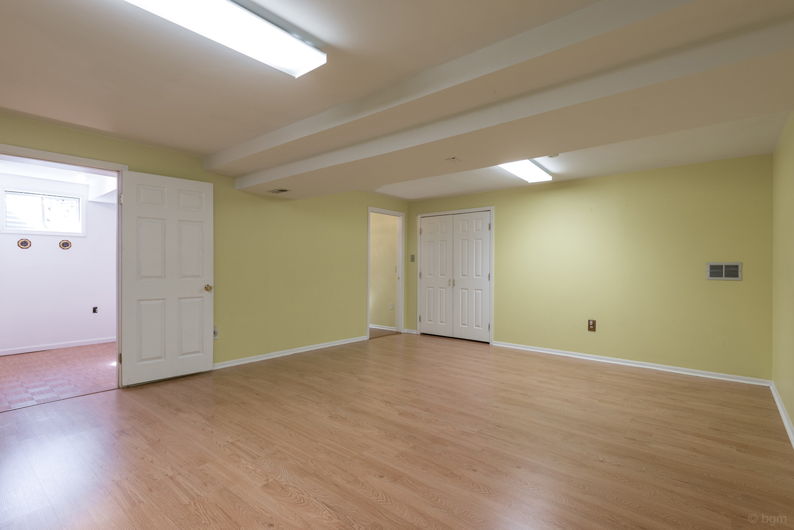 10 Ashcroft Court Bolingbrook, IL 60490 - Photo 28 of 30 an empty room with wooden floor and windows