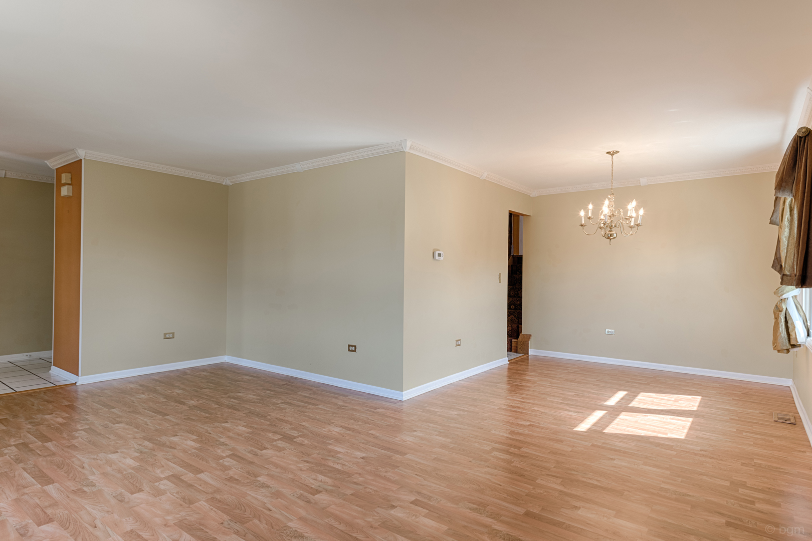 10 Ashcroft Court Bolingbrook, IL 60490 - Photo 4 of 30 an empty room with wooden floor and windows