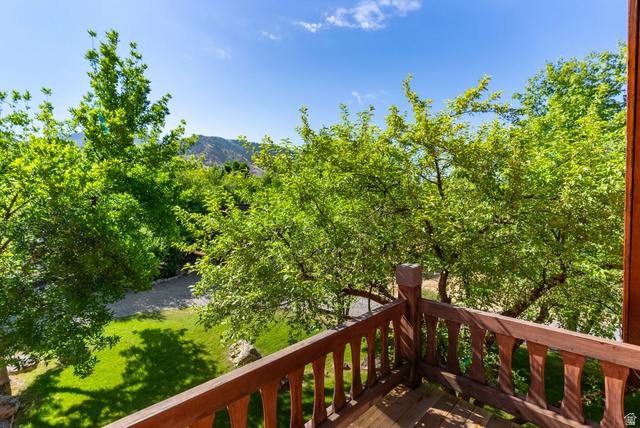 435 Canyon Road Millville, UT 84326 - Photo 30 of 113 Balcony featuring wood-finish railing and flooring