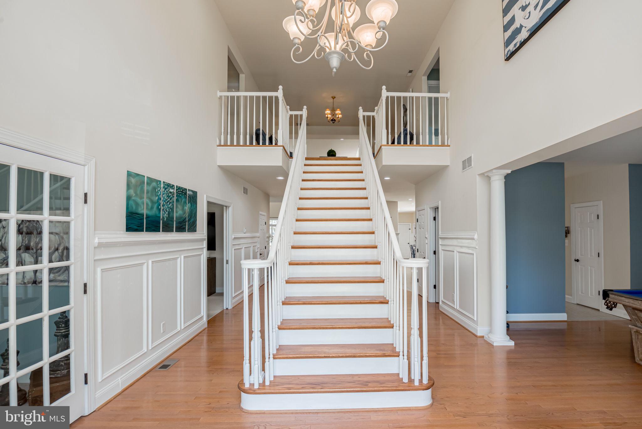 125 Cornwall Road Rehoboth Beach, DE 19971 - Photo 12 of 52 a view of entryway with wooden floor