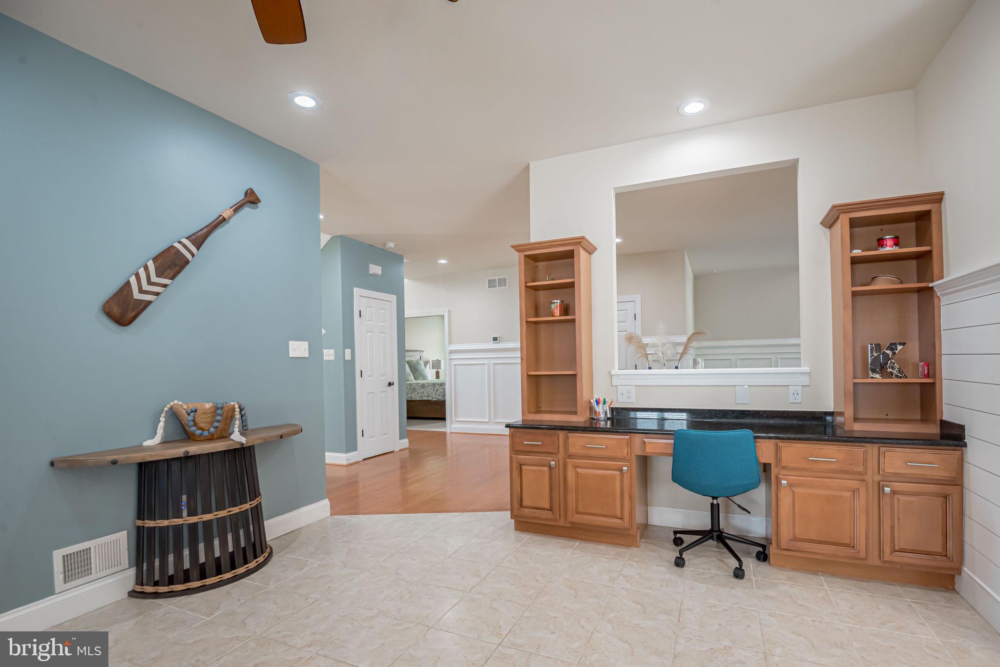 125 Cornwall Road Rehoboth Beach, DE 19971 - Photo 17 of 52 a workspace with furniture and window