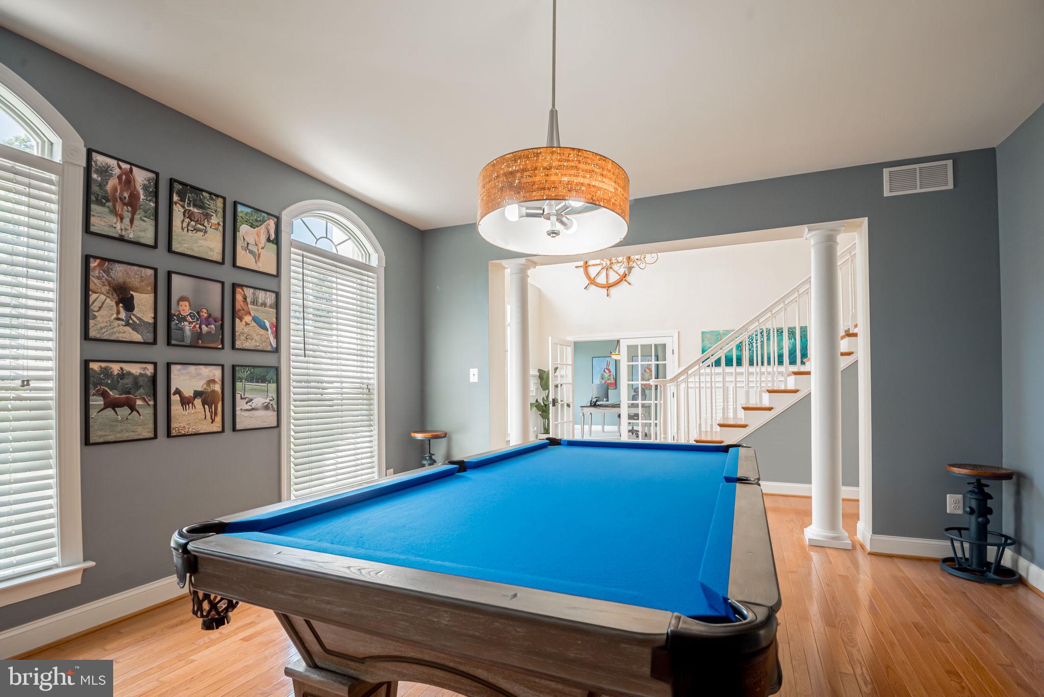 125 Cornwall Road Rehoboth Beach, DE 19971 - Photo 28 of 52 a room with pool table and windows