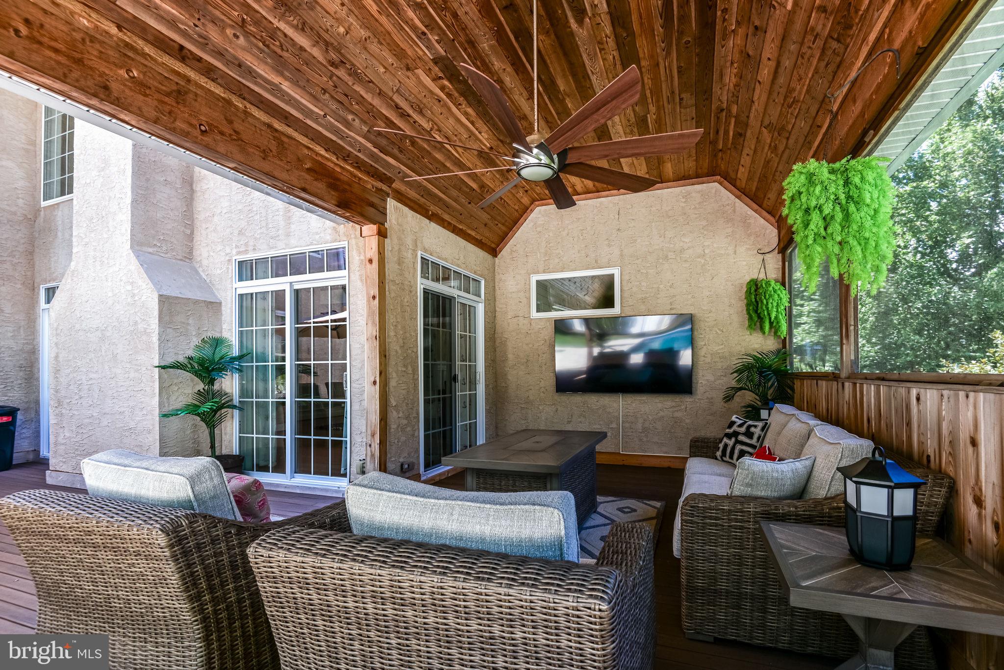 125 Cornwall Road Rehoboth Beach, DE 19971 - Photo 7 of 52 a outdoor space with patio the couches and a potted plant with outer view