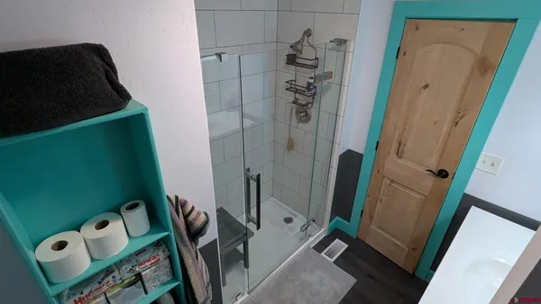 a patio with a table and chairs