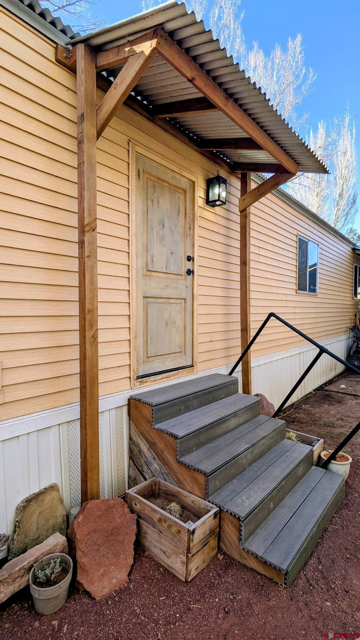 2403 County Road 203, Unit 44 Durango, CO 81301 - Photo 10 of 41 a patio with a table and chairs