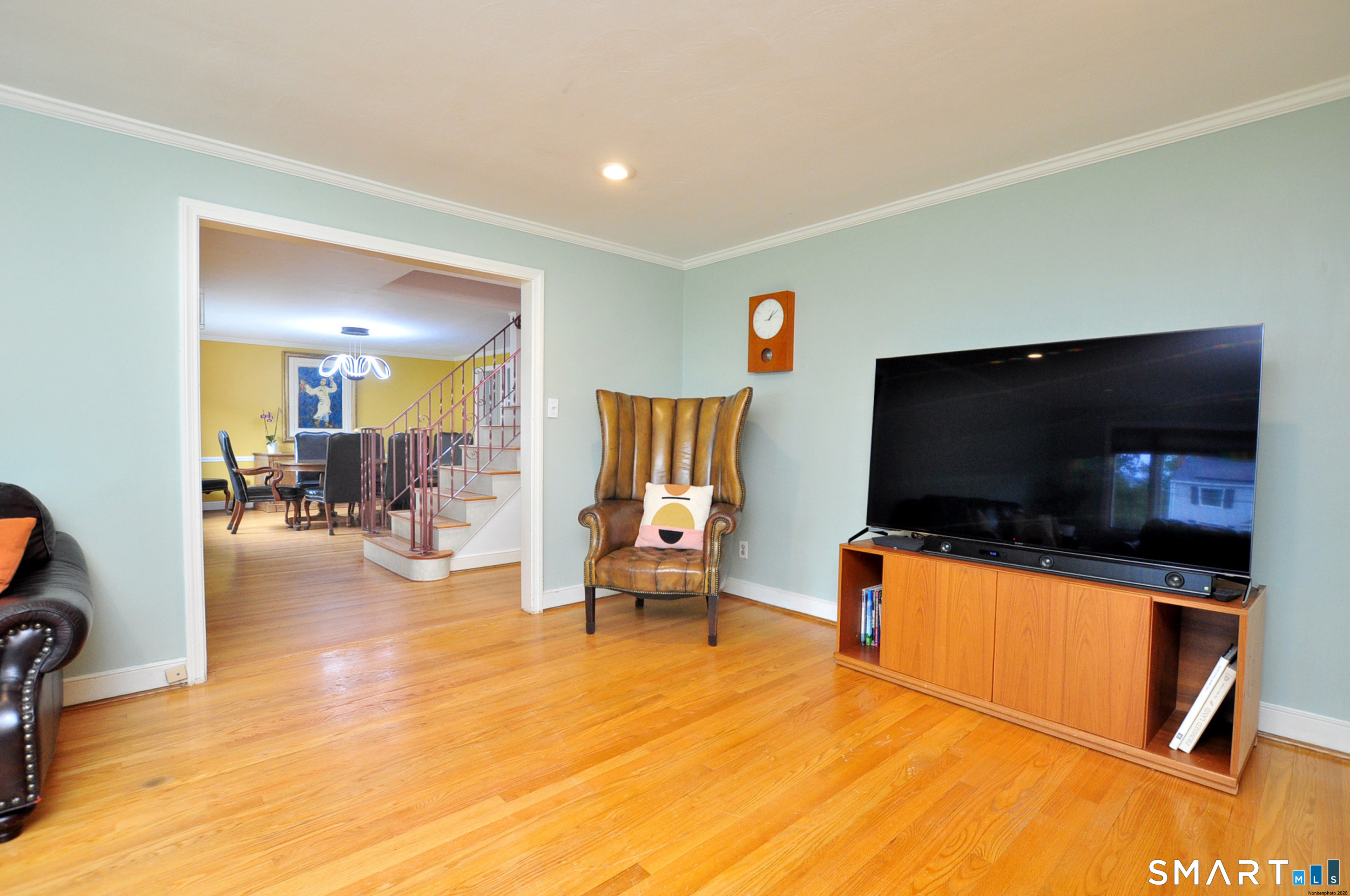 44 Miamis Road West Hartford, CT 06117 - Photo 8 of 39 a living room with furniture and a flat screen tv