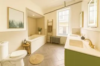 a bathroom with a sink a toilet and a bathtub