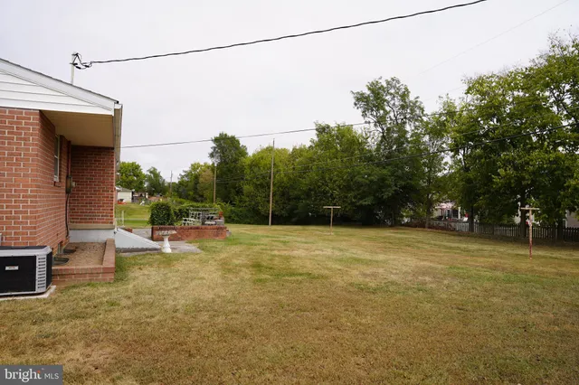 a view of a yard with a slide