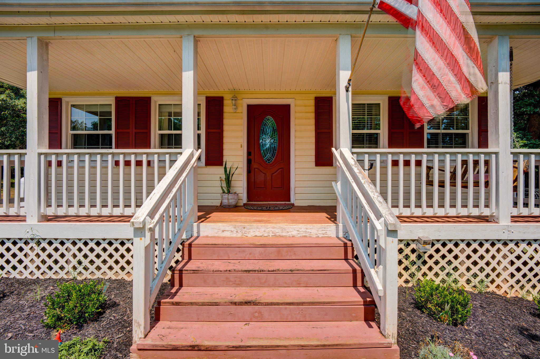 9595 Roys Lane Culpeper, VA 22701 - Photo 45 of 61 Charming porch with welcoming entryway.