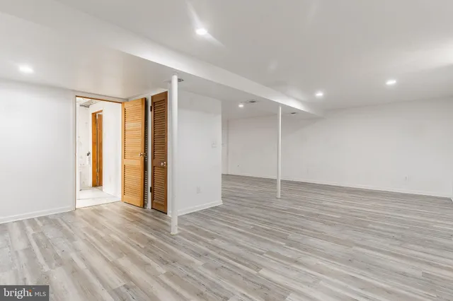 a view of a livingroom with wooden floor
